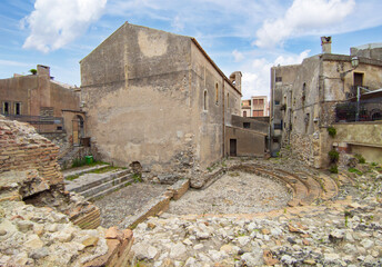 Taormina (Sicilia, Italy) - A historical center view of the touristic city in province of Messina, Sicily island, during the summer, famous for Isola Bella beach and the old theatre