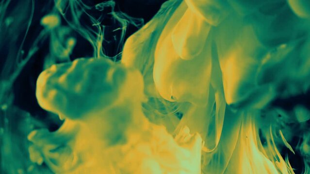 Abstract thick green smoke rising up on a dark background.