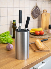 View of the kitchen table, knife holder on the kitchen table, cooking homemade food