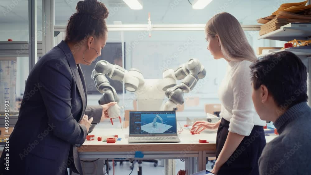 Aufkleber black professor analysis and discuss futuristic robotic arm with two diverse young specialists at re