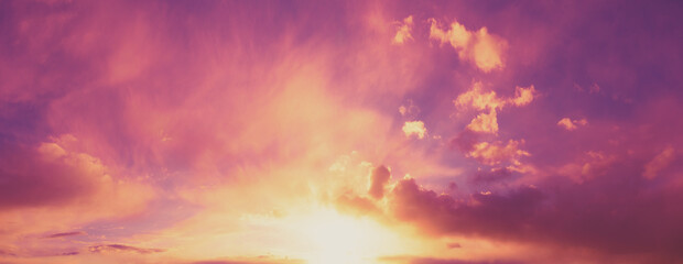 Naklejka na ściany i meble Beautiful cloudy sky at sunset