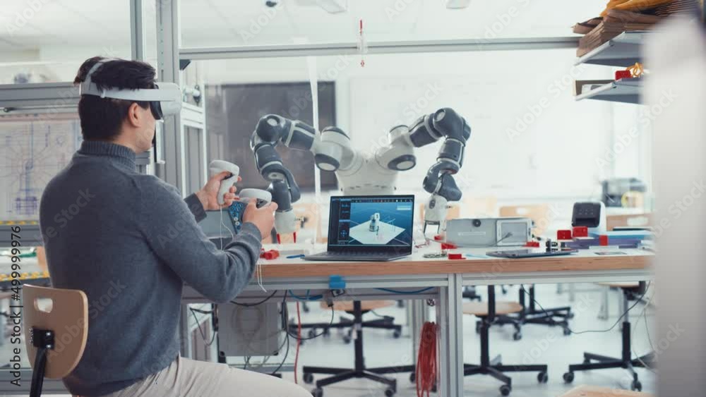 Aufkleber Student Male Engineer Wearing AR Headset Designs and Manipulate Robot Hand while Using Controllers. Futuristic Virtual Design of Mixed Technology Application Concept