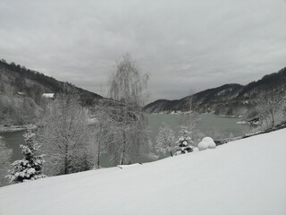 Winter scenery near mountain lake