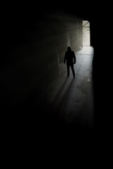 Mysterious figure, terrifying background for cover of book. Novel crime cover.