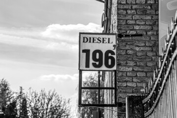sign for sale. old retro petrol station sign and price logo fuel - german language Diesel Price 1,96	in April 2022