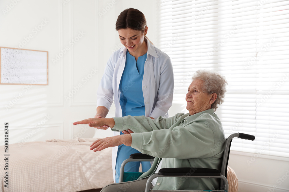 Sticker senior woman in wheelchair doing physical exercise indoors. home health care service