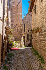 Medieval street in the historic center of Spello, town in Umbria Italy