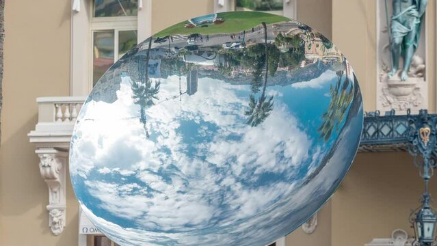 View of Sky Mirror sculpture timelapse in front casino building in Monte Carlo