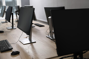 Many modern computers in open space office