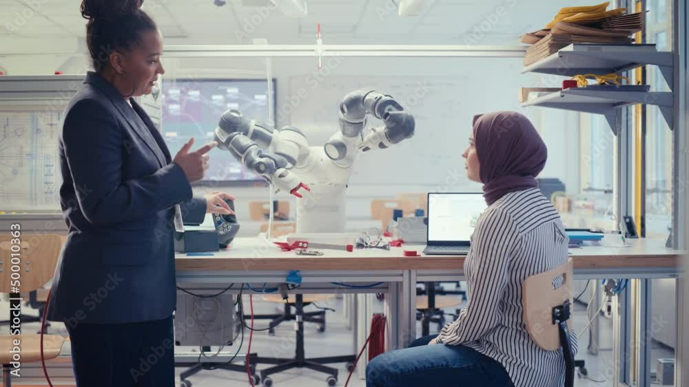 Poster Skilful Black Specialist Explain to Arabic Computer Science Specialist While Robot Limb Moving Under her Controlling. People Designing Automated Robotic Systems Concept