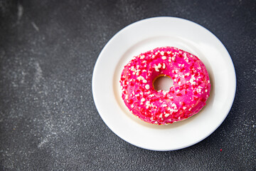 donut pink sweet dessert meal food snack on the table copy space food background