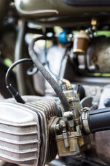 close up of retro bike, vintage motorcycle, carburetor