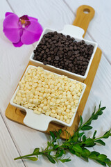 Small colored chocolates. Glazed chocolate. Sweet dragee stones. Desserts for Candy Bar. Small multi-colored candies.