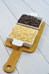 Small colored chocolates. Glazed chocolate. Sweet dragee stones. Desserts for Candy Bar. Small multi-colored candies.