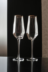 an assortment of empty crystal glasses for each type of beverage in transparency