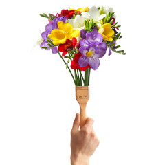 Creative design with photo of man holding paint brush and beautiful freesia flowers on white background. Spring is coming