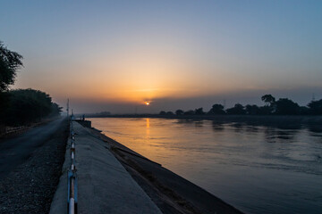 Fototapeta na wymiar Sunrise at Narmada Canal, Ahmedabad