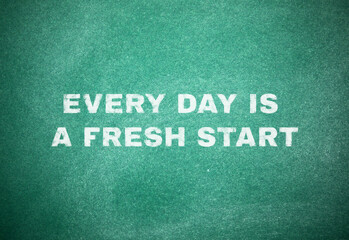 Every Day Is A Fresh Start. Motivational quote inspiring to seize all opportunities. Text on green...