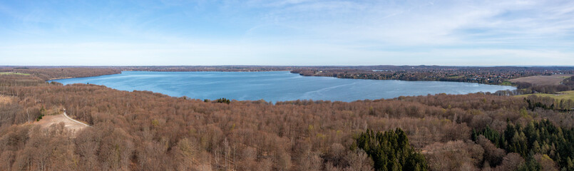Obraz premium Farum, Denmark - April 20, 2022: Aerial drone view of Furso Lake in northeastern Zealand.