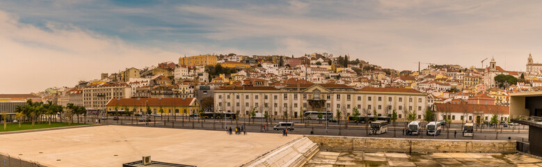 A view towards the Alfama distict from the cruise terminal in the city of Lisbon on a spring day