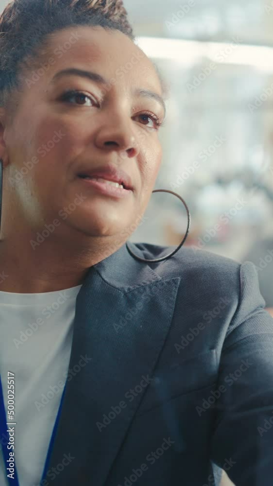 Aufkleber black female teacher write big and complex mathematical formula/ equation on the transparent board w