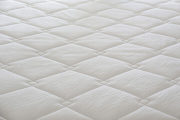 Close up shot of white orthopedic mattress top side surface pattern with a lot of copy space for...
