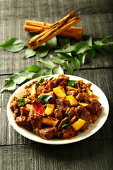 Plate of delicious meat fry,  ulath erachi, irachi, from Kerala cuisine. fried beef, mutton, 