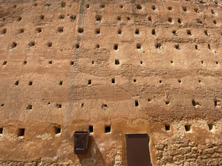 weathered walls around the hassan tower - obrazy, fototapety, plakaty
