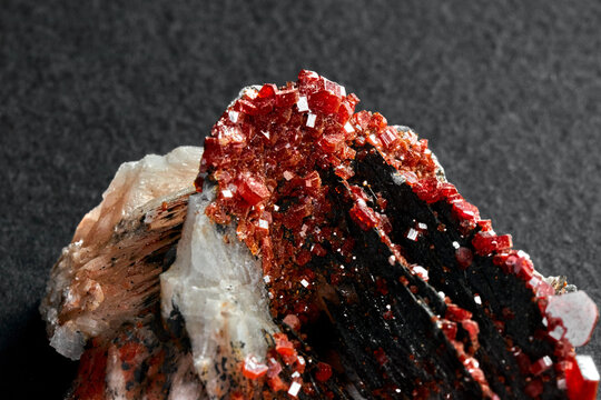 Closeup shot of vanadinite over a grey background