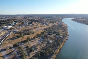 Aerial shot of the lake marble falls reservoir during the day in Texas