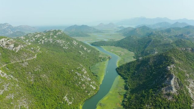 Aerial view of meandering line of river Crnojevica in Montenegro. Skadar lake national park