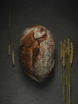 Bread near ears of wheat