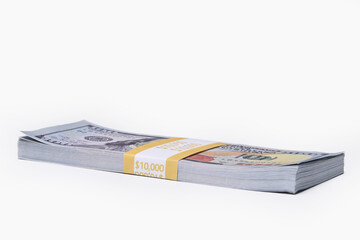 Stack of ten thousand American dollars isolated on white background