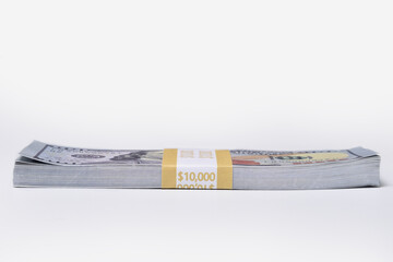 Stack of ten thousand American dollars isolated on white background