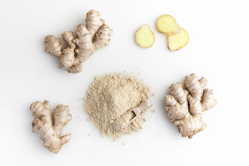 Set of fresh ginger root with slice and powder islolated on white background. Top view.