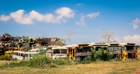 Rusted and Crushed Buses on the Tank Graveyard in Asmara, Eritrea