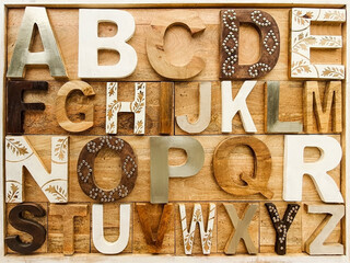 Top view of English alphabet with wooden letters