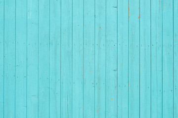 Old vintage beach wood background or wallpaper - faded turquoise wood planks