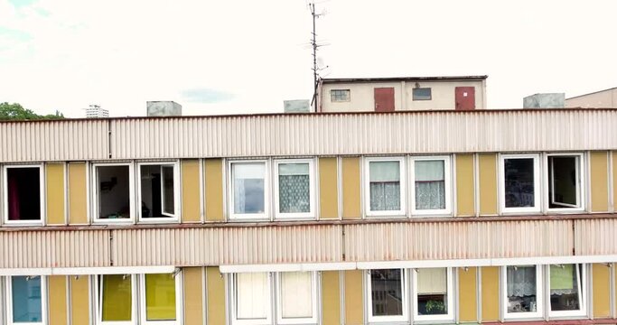 Prefabricated tower block panelak housing apartment buildings drone aerial 4K