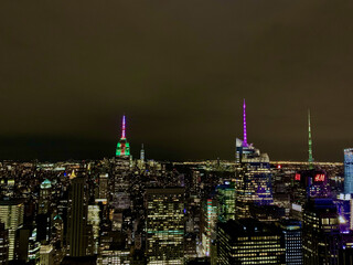 Aerial view of the cityscape of New York City with skyscrapers and Rockefeller Center, USA at night
