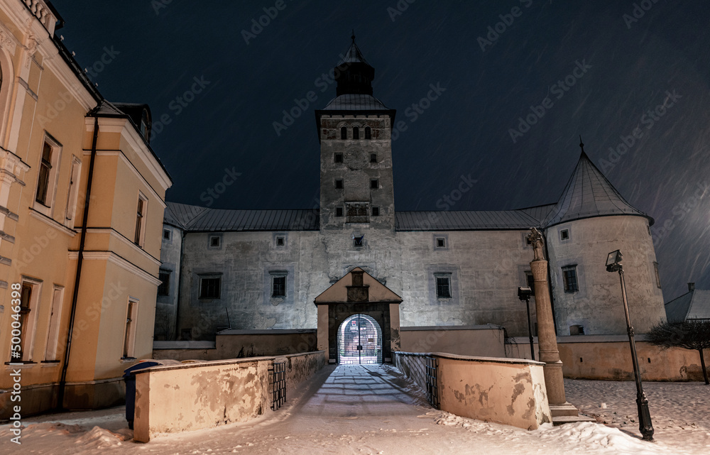 Sticker Photo of a historic renaissance castle in Slovakia at night