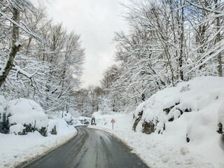 Dangerous snowy mountain road