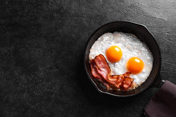 Fried eggs and bacon for breakfast