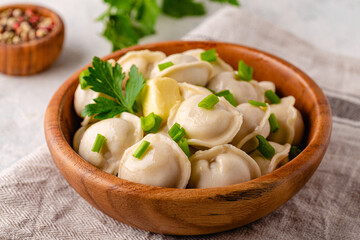 Homemade meat dumplings - russian pelmeni.