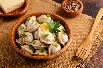 Homemade meat dumplings - russian pelmeni.