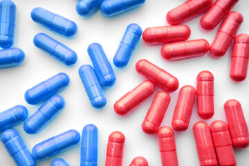 Vitamins. Fish Fat Oil Capsules. Fish oil capsules isolated on white background. Close up of capsules Omega 3 on white background. Health care concept. Nutritional supplements.