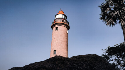 Low angle shot of the Mahabalipuram lighthouse in Tamil Nadu