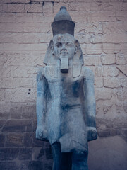 Vertical shot of an ancient pharaoh statue in Karnak Temple, Luxor, Egypt