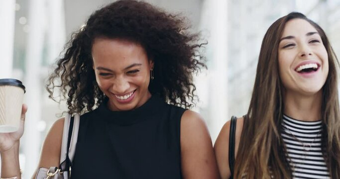 Make that business connection with your colleague. 4k video footage of two beautiful young businesswomen in a modern office.