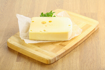 Maasdam cheese over the board